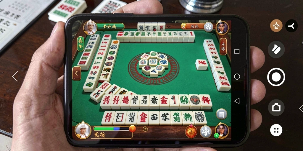 Tampilan gameplay menarik dari HARAPJP dengan ubin Mahjong yang berwarna-warni.